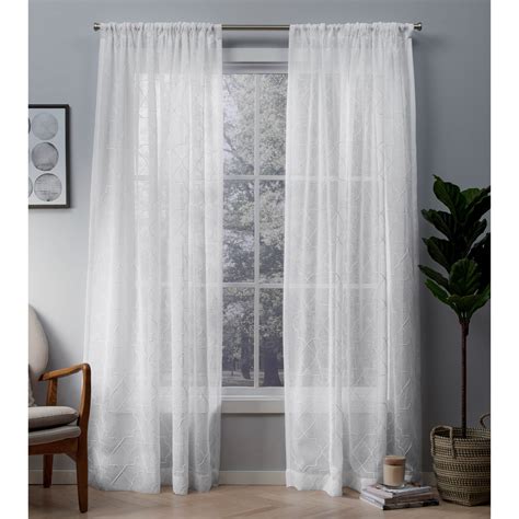 The beautifully embroidered design adds texture and style to your space while allowing natural light to filter through. . Embroidered sheer curtains